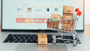 Boxes With Shopping Cart On A Laptop Computer 300x169